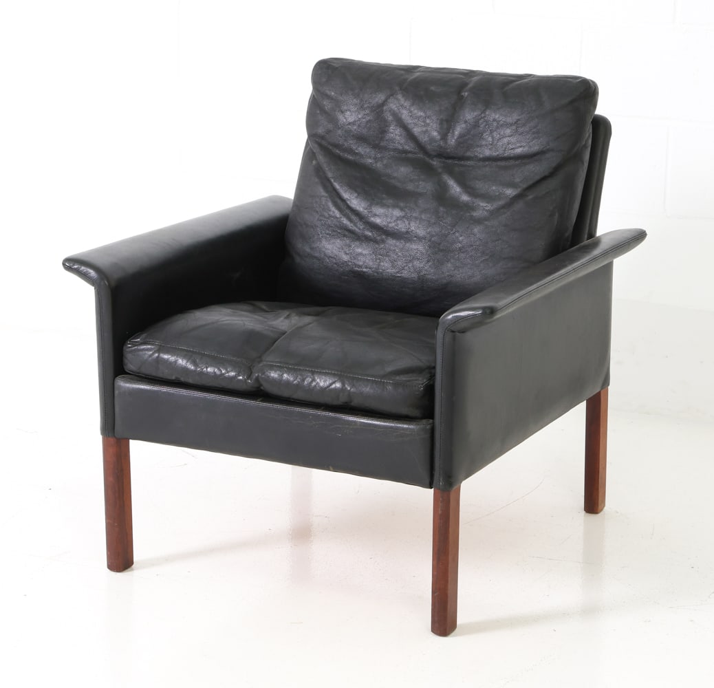 HANS OLSEN FOR CS MOBLER LEATHER EASY CHAIR 1960S: Model 500 lounge chair. Rosewood legs and leather upholstery with flared armrests. Stamped under seating. Denmark, circa 1960s. Dimensions: H 28.25" x W 29.75" x D 30" x Sh 15" Condition: Minor rubs a