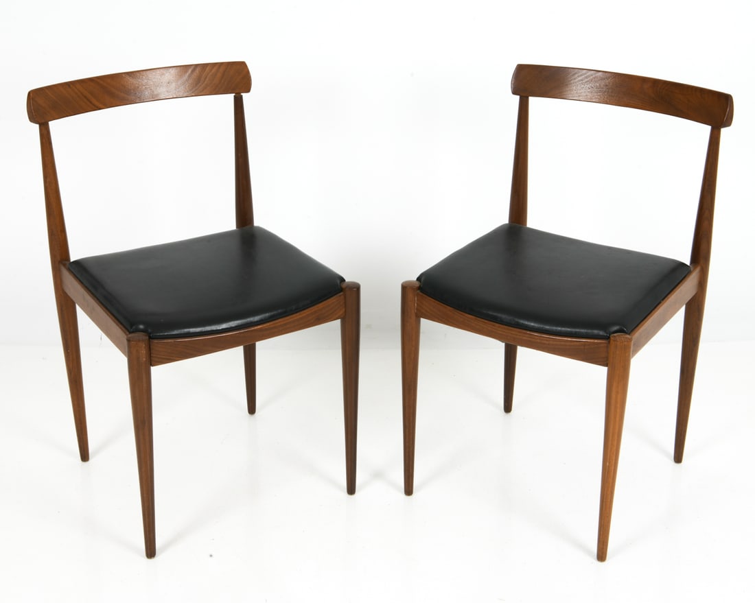 PAIR OF OLSEN STYLE DANISH ROSEWOOD SIDE CHAIRS: Rosewood frame and black leather upholstery. Curved slander backrest with tapered legs. Denmark, circa 1960s. Dimensions: H 32" x W 19" x D 18.5" x SH 18" Condition: Wear consistent with age and use.