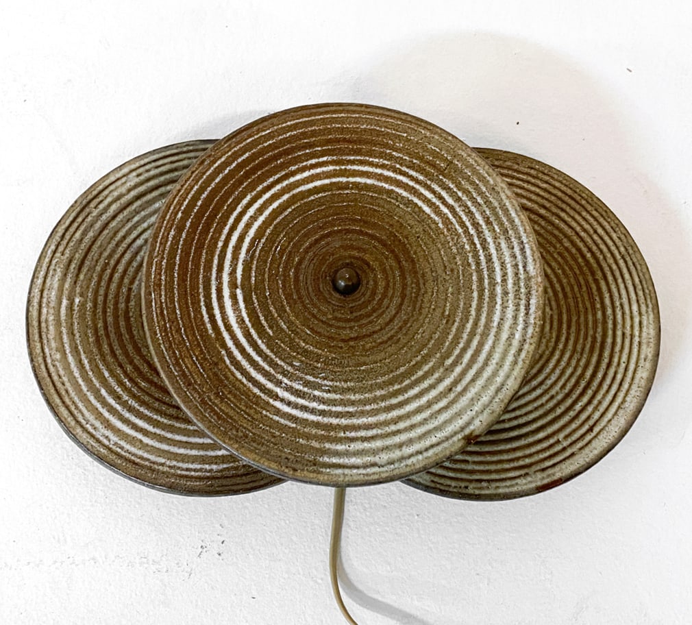 DANISH CERAMIC WALL LIGHT C. 1970S: Ceramic wall light with sculptural design. Denmark, circa 1970s. Dimensions: H 4.75" x W 17" x D 9.75". Condition: Presents well. Wiring not tested.