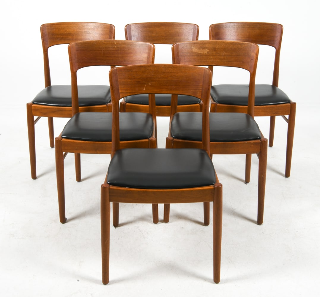 (6) HENNING KJAERNULF TEAK DINING CHAIRS C. 1960S: Model 26 for K/S Korup Stolefabrik. Stamped under seats. Teak frames with black leather upholstery. Denmark, circa 1960s. Dimensions: H 31.5" x W 17.5" x D 18.5" x SH 17". Condition: Minor scratches a