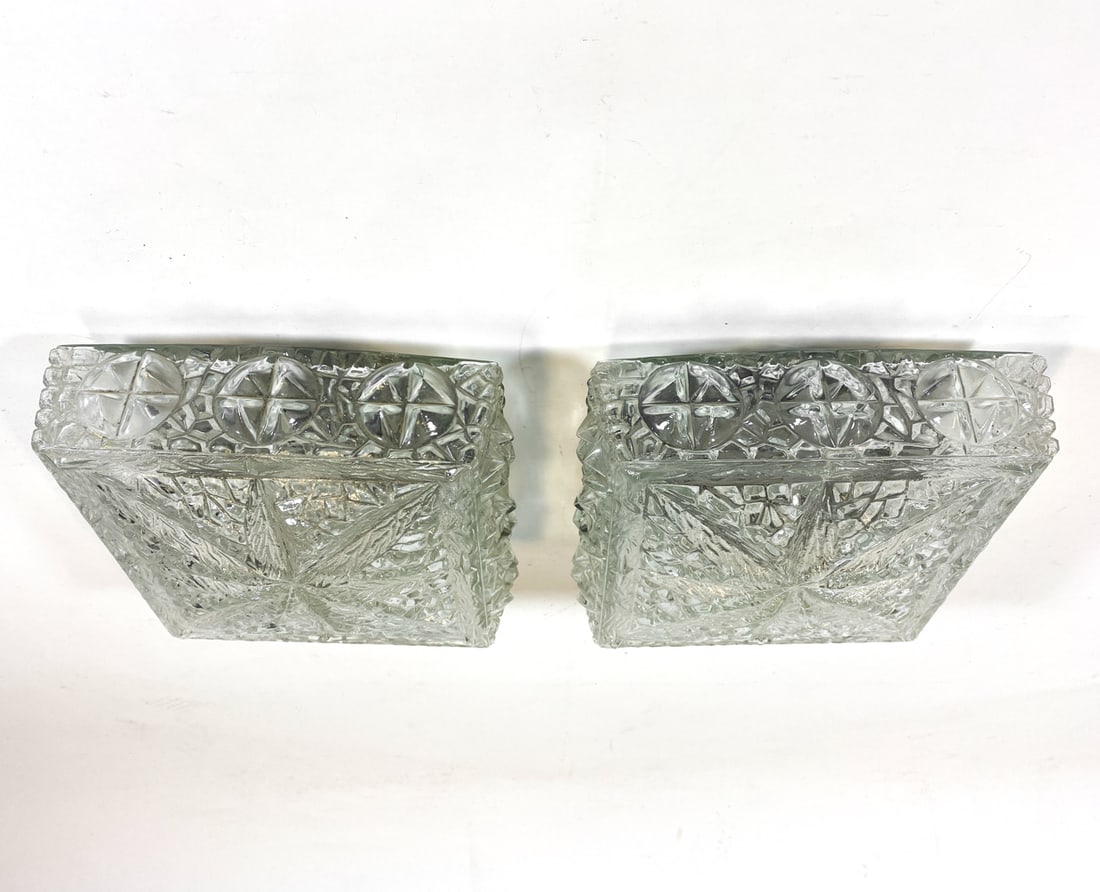 PAIR OF DANISH GLASS CEILING LAMPS C. 1960S: (2) Textured glass ceiling lights. Denmark, circa 1960s. Dimensions: H 5" x W 9" x D 9". Condition: Wiring untested, minor scuffs. Few paint marks to brackets. Wear consistent with age and use.