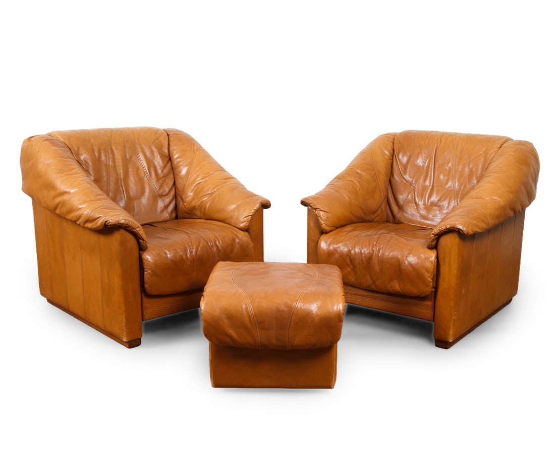 PAIR OF GERMAN LEATHER CHAIRS AND OTTOMAN C. 1970S (1 of 1)