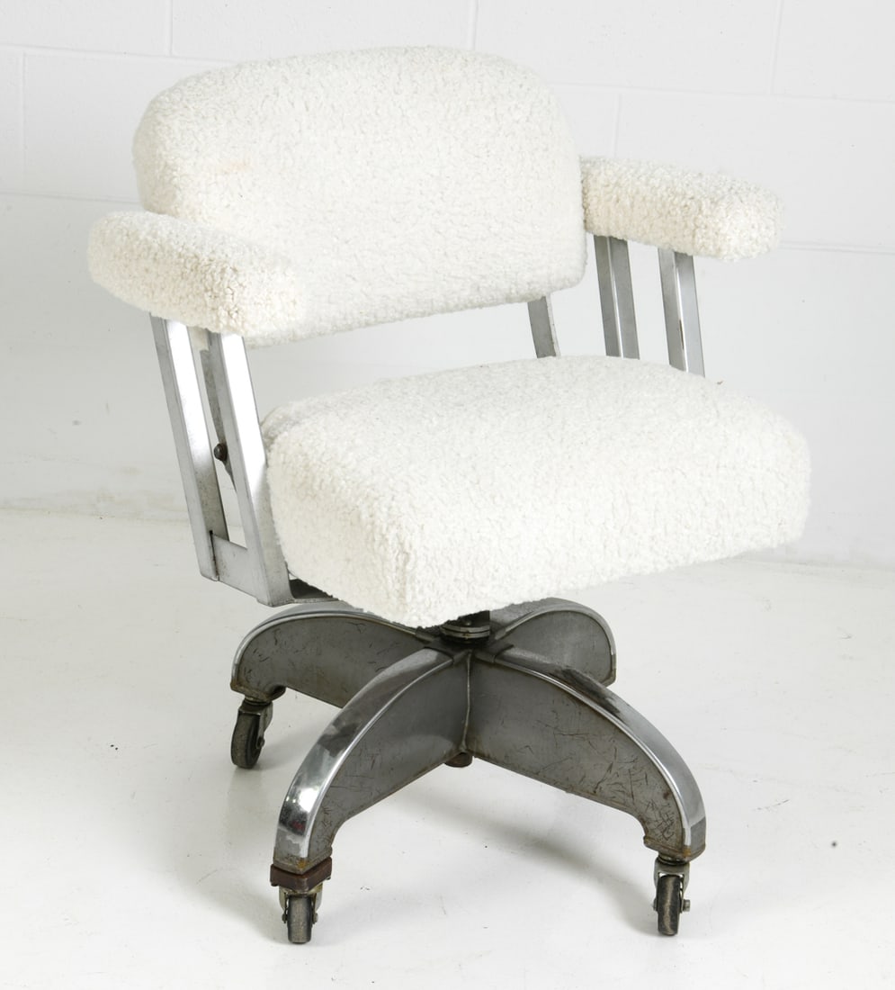 VINTAGE DOMORE OFFICE SWIVEL CHAIR: Office swivel chair upholstered in white faux shearling and a steel X-form base on casters. Labeled on underside, made by the DoMore Chair Company. Dimensions: H 32" x W 27.5" x D 23" x SH 20" Conditi