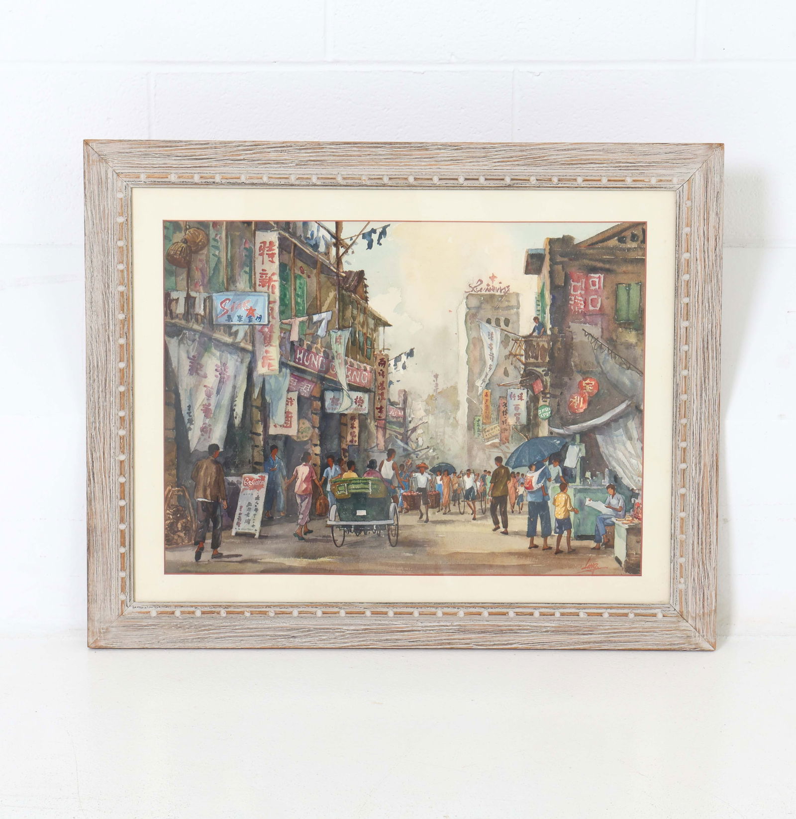 KAM CHEONG LING (HONG KONG, 1911-1991) WATERCOLOR: Chinese street scene by Kam Cheong Ling. Signed lower right. Watercolor on paper. Dimensions: (Frame) H 21.5" x W 26.75" (Sight) H 15" x W 20" Condition: Minor scuffs to frame.