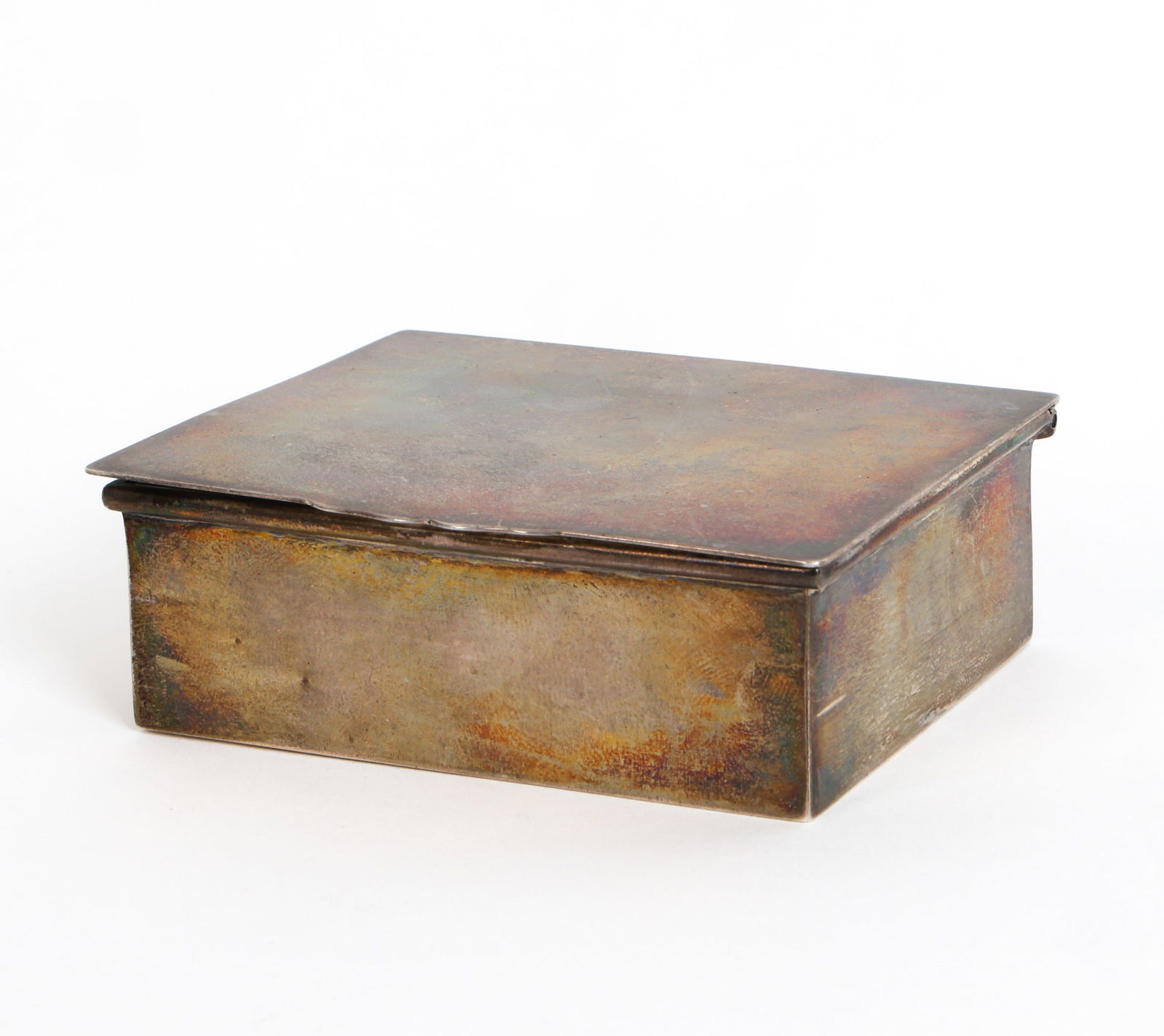 VINTAGE GEORG JENSEN STERLING SILVER JEWELRY BOX: Designed by Georg Jensen, model 210, vintage sterling silver jewelry box. Engraved on the underside. Dimensions: H 2" x W 5" x D 4" Condition: Wear consistent with age and use. Patina. Some nicks, scu