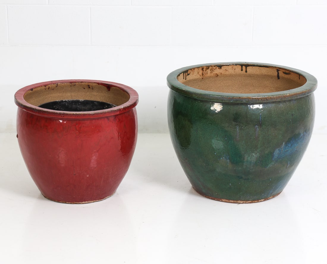 (2) LARGE GLAZED CERAMIC PLANTERS: Two glazed ceramic garden jardiniere or pots in red and green colors. Dimensions: (Largest) H 19" x Diameter 24" Condition: Surface marks and glaze inconsistency present. Wear consistent with age and