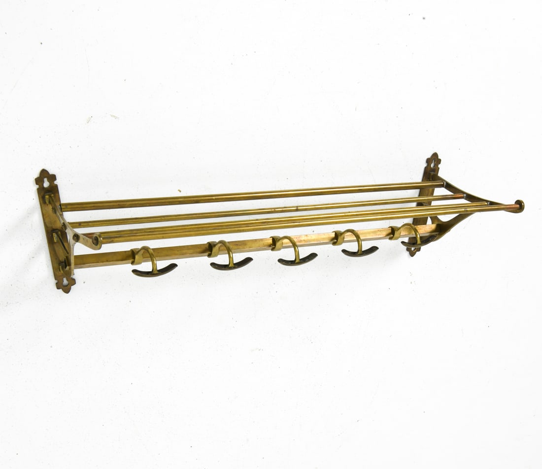 VINTAGE WALL MOUNTED BRASS COAT RACK SHELF: Features rods for hangers and hooks for hats or coats. Apparently unmarked. Dimensions: H 8" x W 28" x D 10" Condition: Missing screw to proper right side, Slight bend to metal to right side, slight s