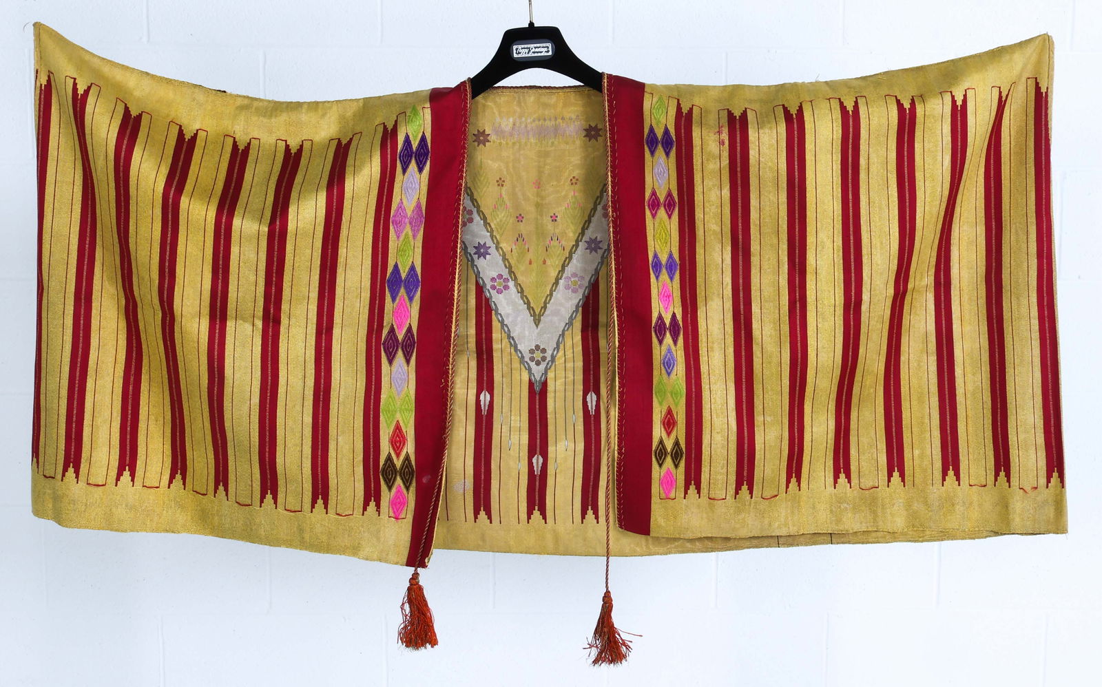 KING FAROUK (1920-1965) EGYPTIAN SILK ROBE: Purported to have belonged to King Farouk of Egypt(1920-1965). Acquired from an Egyptian antique dealer in the 1950s after his removal from the throne. Dimensions: H 25.25" x W 54.75" Condition: Wear