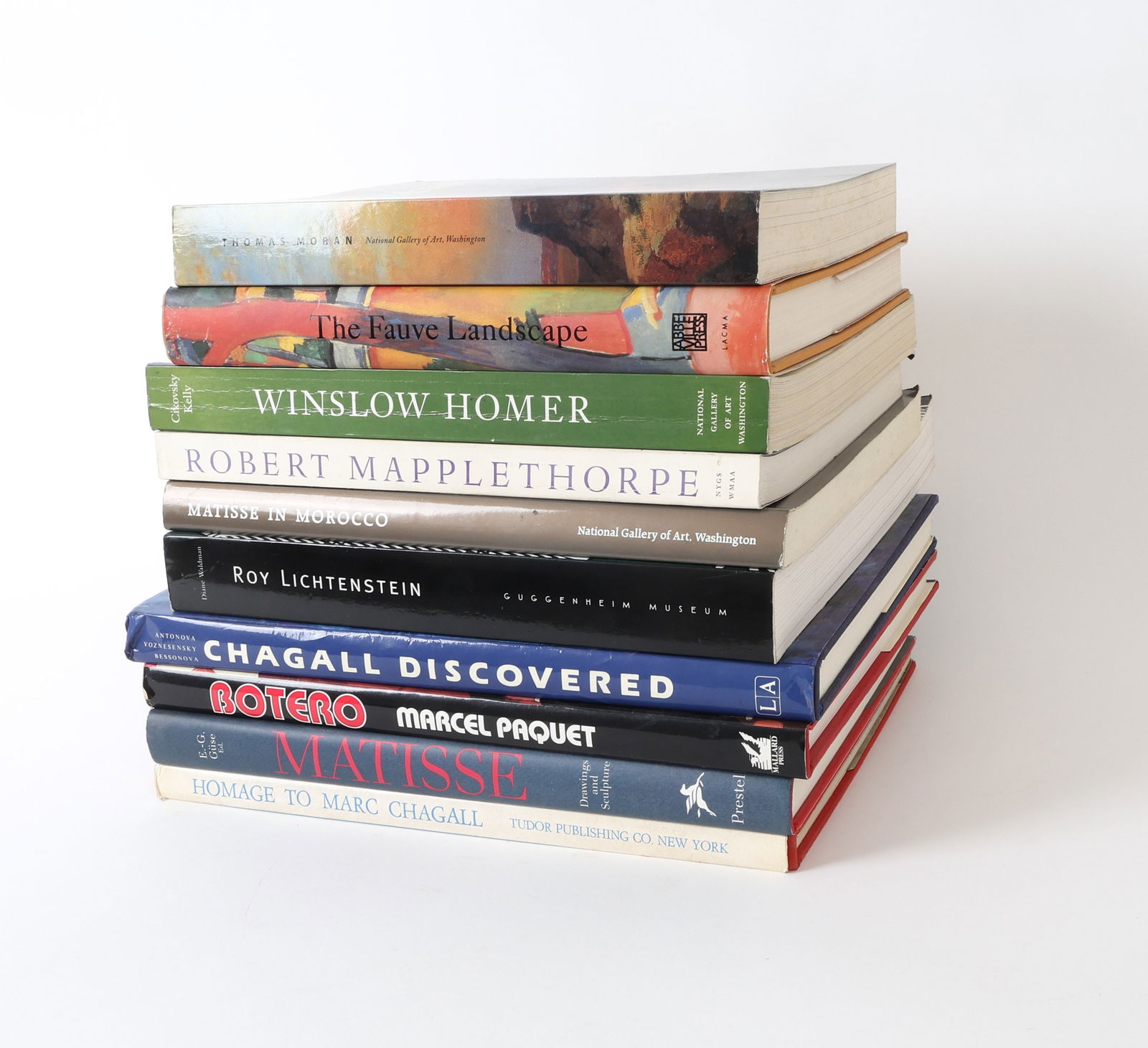 COFFEE TABLE ART BOOK GROUPING: (10) Books about Chagal, Matisse, Roy Liechtenstein and more. Dimensions: (Biggest) H 13" x W 10" x D 1" Condition: Wear consistent with age and use including minor rubs and scuffs.