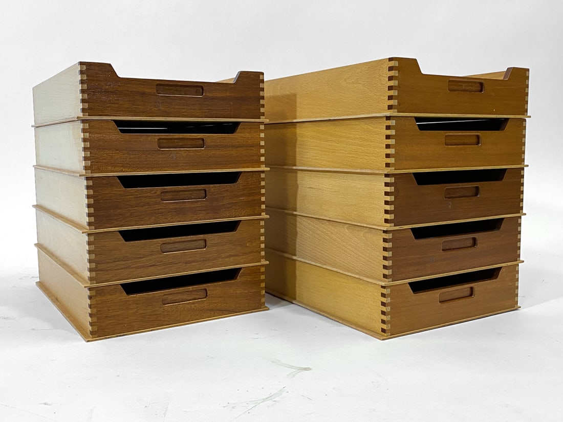 DANISH TEAK & BEECH LETTER TRAY GROUPING C. 1960S: Grouping of (10) letter trays made from teak and beech wood. Denmark, circa 1960s. Dimensions: Each H 2.75" x W 10.75" x D 16.5". Condition: Minor scuffs, rubs, and dings. Wear consistent with age