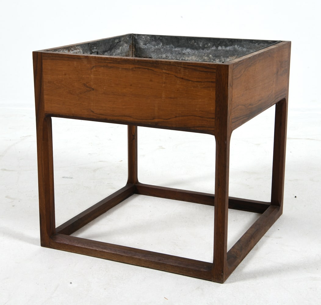 AKSEL KJERSGAARD DANISH ROSEWOOD PLANTER C. 1960S: Rosewood frame with metal liner. Apparently unmarked. Denmark, circa 1960s. Dimensions: H 17.5" x W 17.5" x D 17.5". Condition: Showing signs of wear including water marks and oxidation to metal tray