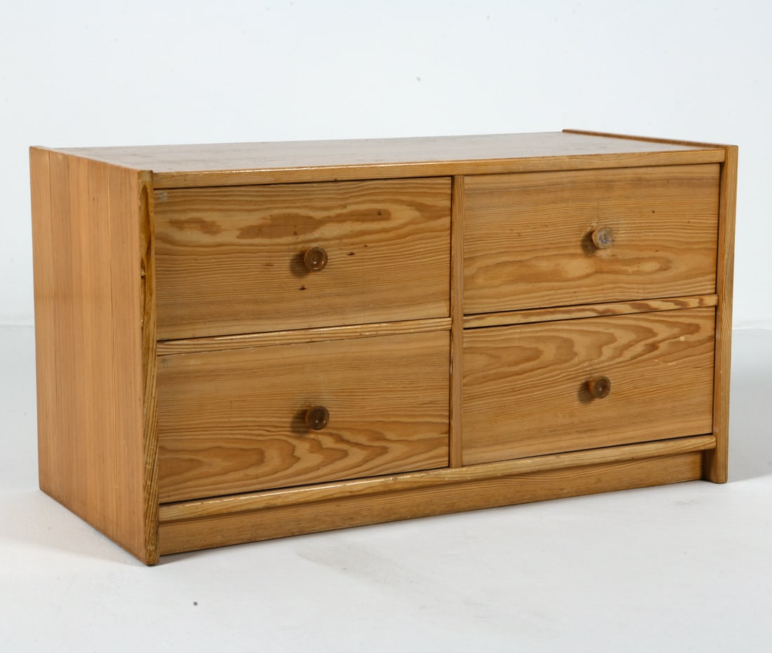 DANISH PINE LOW CHEST OF DRAWERS C. 1970S: Low pine hall chest with carved drawer pulls. Denmark, circa 1970s. Dimensions: H 19.25" x W 35.5" x D 16.5". Condition: Minor scuffs and chips, wear consistent with age and use.