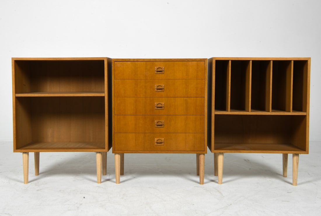 DOMINO STYLE DANISH OAK BOOKCASE & CHEST GROUPING: Includes bookcase with (1) shelf, media bookcase, and chest of drawers. Denmark, circa 1970s. Dimensions: Each H 32" x W 23.75" x D 12". Condition: Minor scuffs and dings with slight sun fading to top