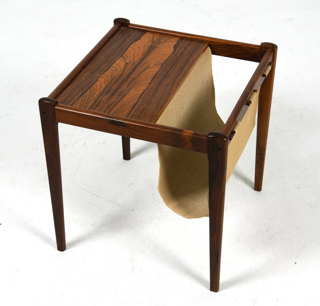 BRDR. FURBO DANISH ROSEWOOD MAGAZINE RACK C. 1970S: Rosewood magazine rack or small side table with linen sling. Apparently unmarked. Denmark, circa 1970s. Dimensions: H 18.5" x W 17.5" x D 17.5". Condition: Minor scuffs to wood, wear consistent with a