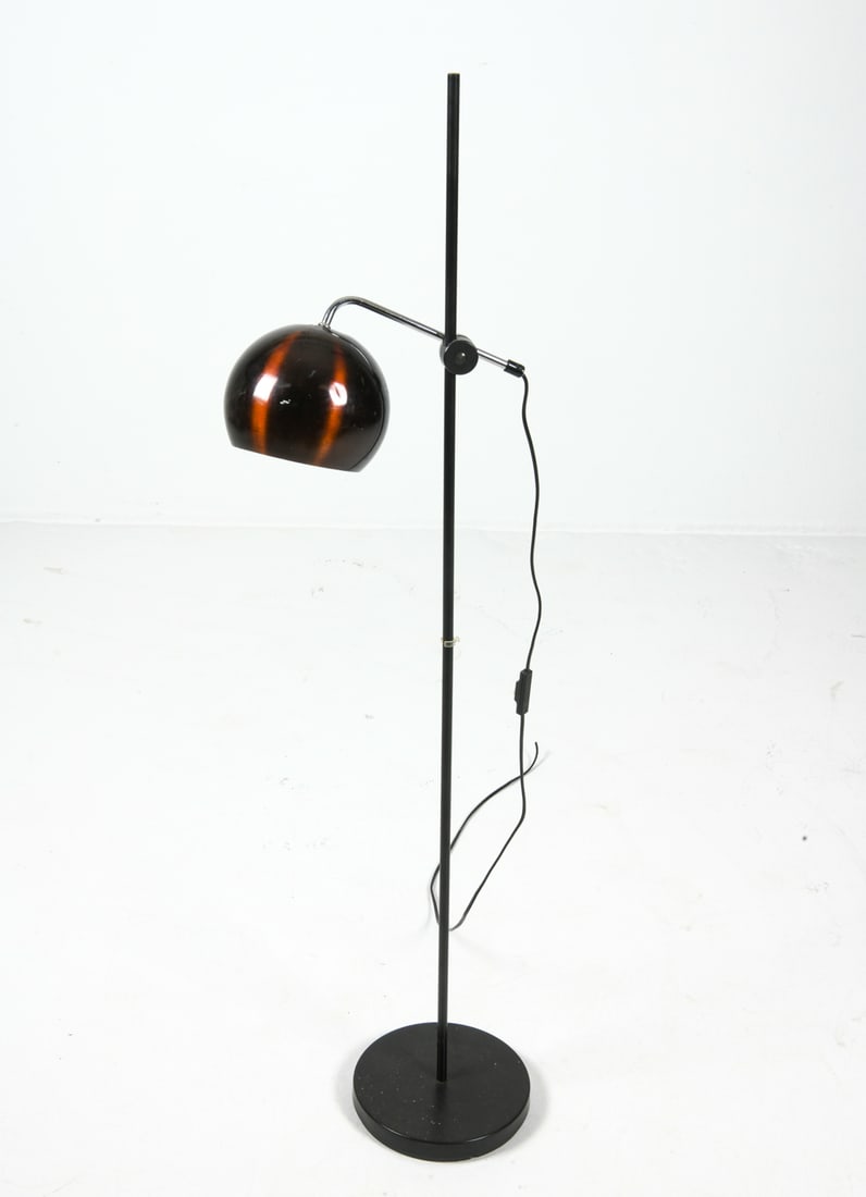 DANISH SPACE AGE EYE BALL FLOOR LAMP: Steel stand with aluminum shade in classic 'eye-ball' shape. Denmark, circa 1970s. Dimensions: H 51" x W 9.25" x D 14.5". Condition: Cord cut, Not tested, Wear consistent with age and use.