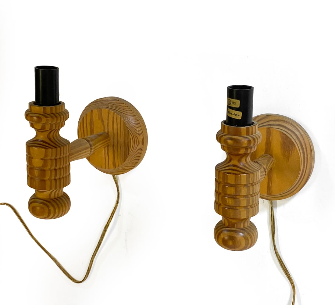 PAIR OF DANISH PINE WALL SCONCES C. 1970S: Dimensions: H 7.5" x W 4.5" x Dia. 6.75". Condition: Wiring untested, cords cut. Wear consistent with age and use.