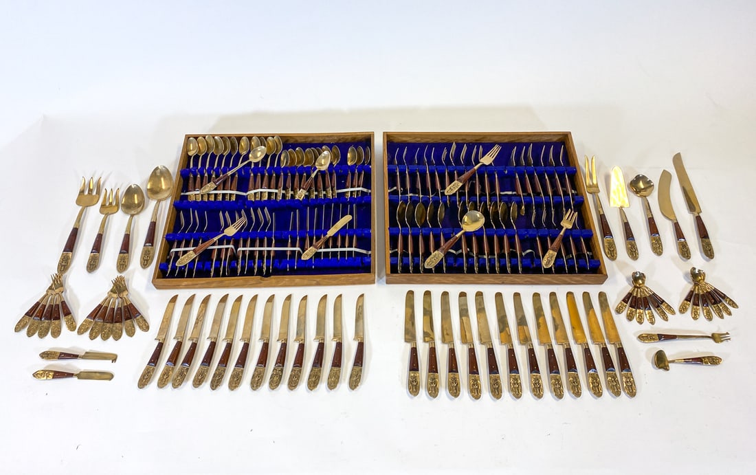 SIAM ROSEWOOD & BRASS FLATWARE GROUPING: Large grouping of flatware with detailed brass accents, rosewood handles. Thailand, mid 20th century. Dimensions: Longest L 11.5". Condition: Minor scuffs to wood and metal, wear consistent with age a