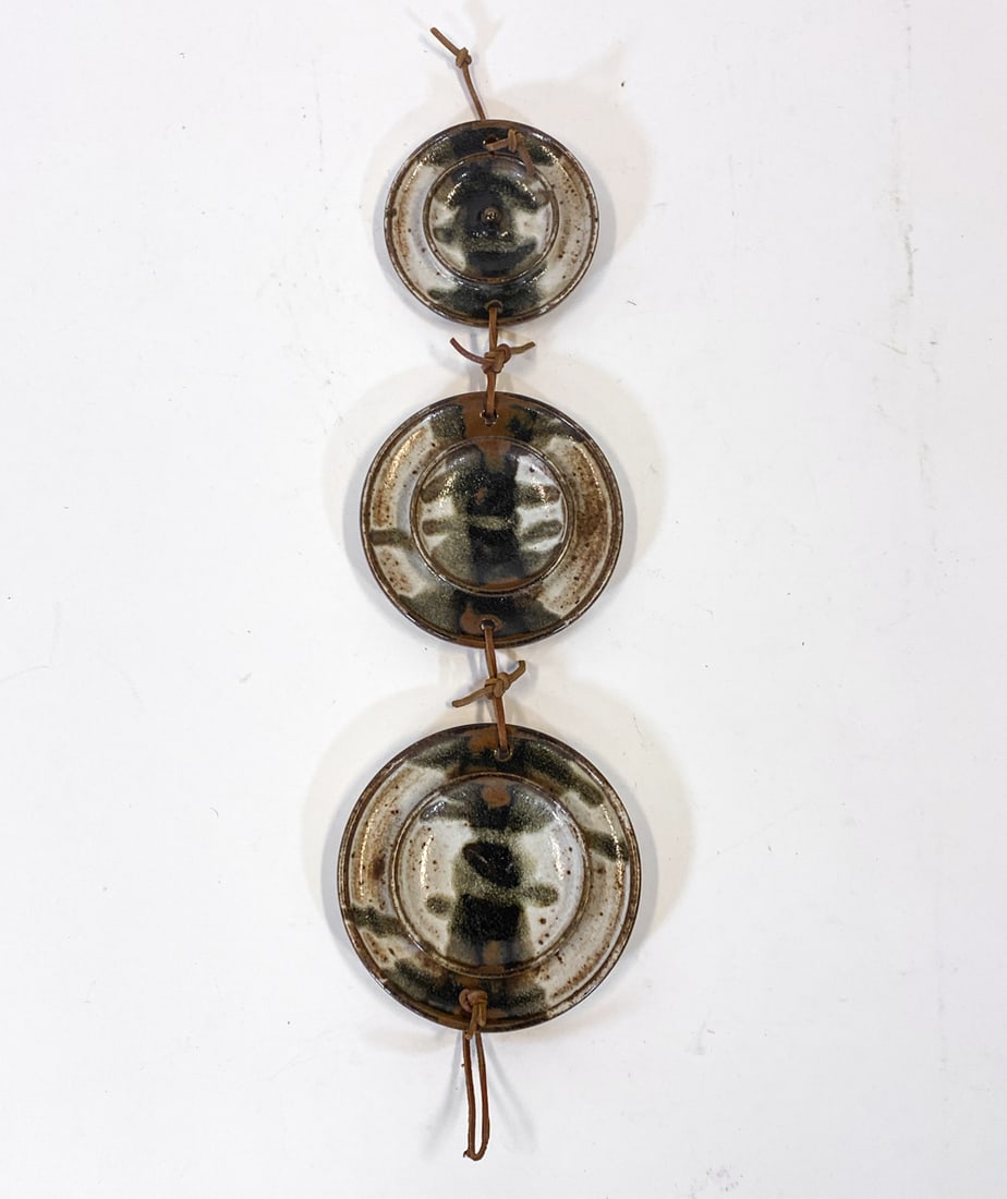 DANISH CERAMIC HANGING WALL ART C. 1970S: Signed indistinctly to back of each plate. Denmark, circa 1970s. Dimensions: H 17.5" x W 6". Condition: Minor scuffs, wear consistent with age and use.