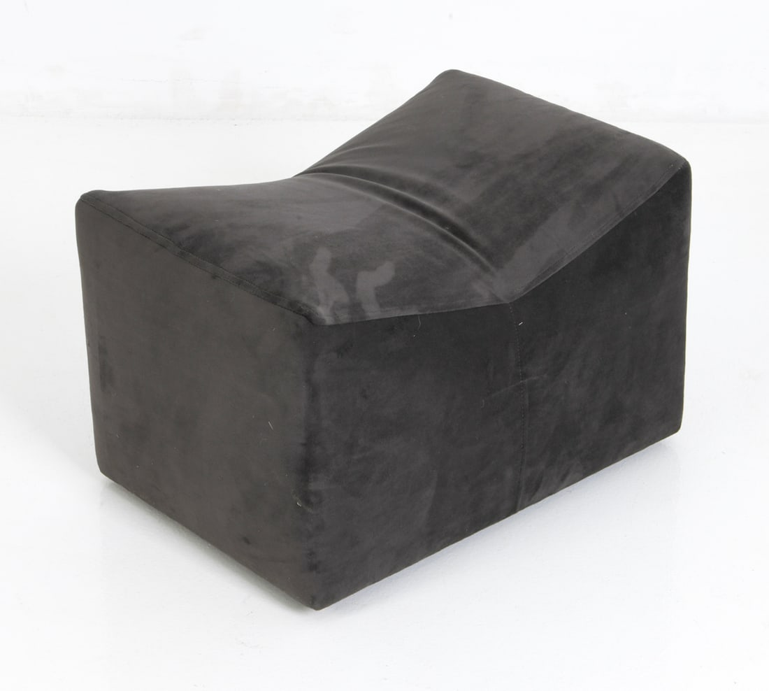 MILO BAUGHMAN FOR THAYER COGGIN SADDLE OTTOMAN: Curved frame with velvet upholstery on casters. Marked on the underside. Circa 1960s. Dimensions: H 13.25" x W 20.5" x D 15" Condition: Wear consistent with age and use. Very small hole to one side.