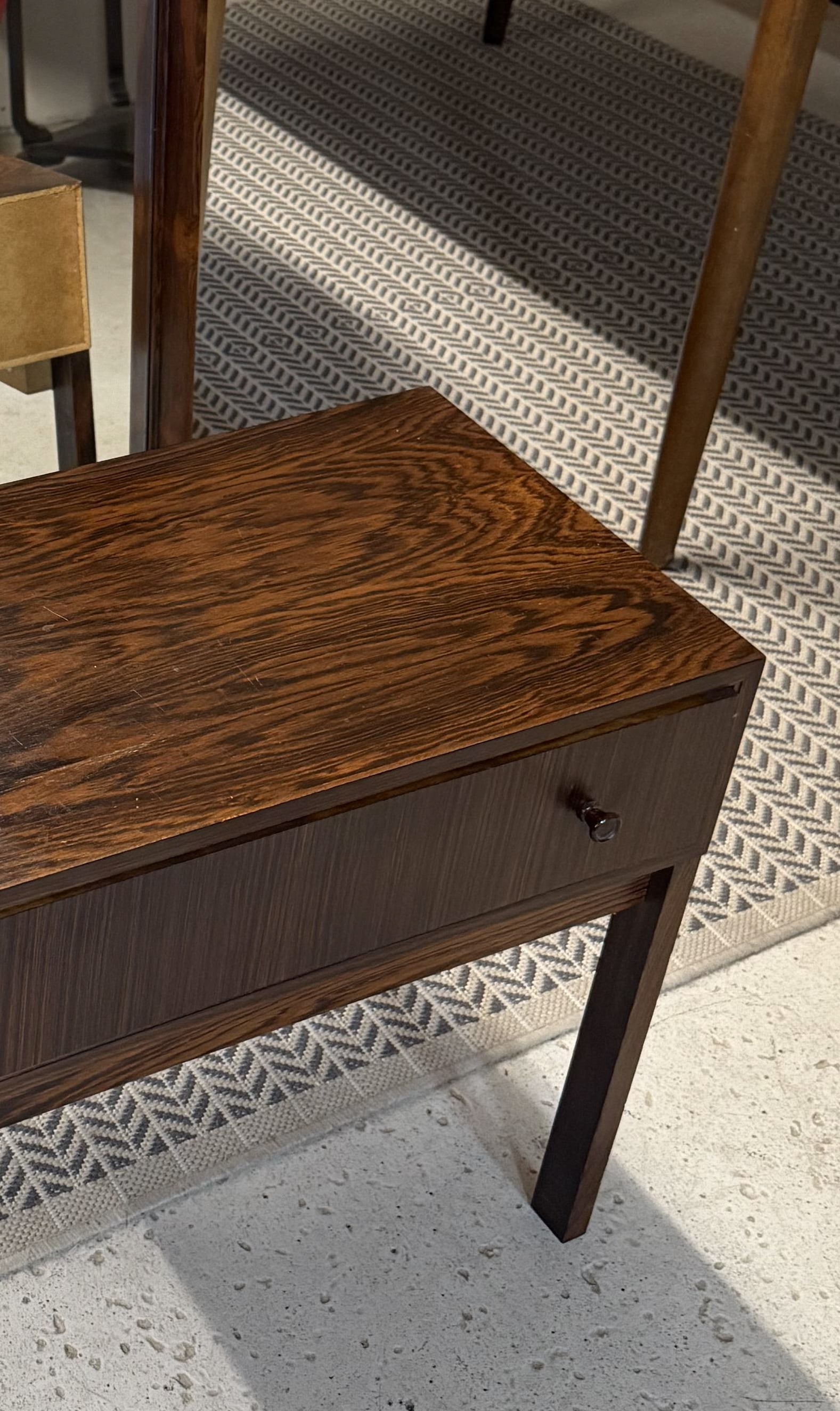 STYLE OF KRISTIANSEN ROSEWOOD CHEST & MIRROR: *PHOTOS UPDATED SHORTLY Rosewood veneer hall chest of drawers featuring round pulls. Includes a matching mirror frame. Apparently unmarked. Denmark, circa 1960s. Dimensions: (Chest) H 19.75" x W 23.75