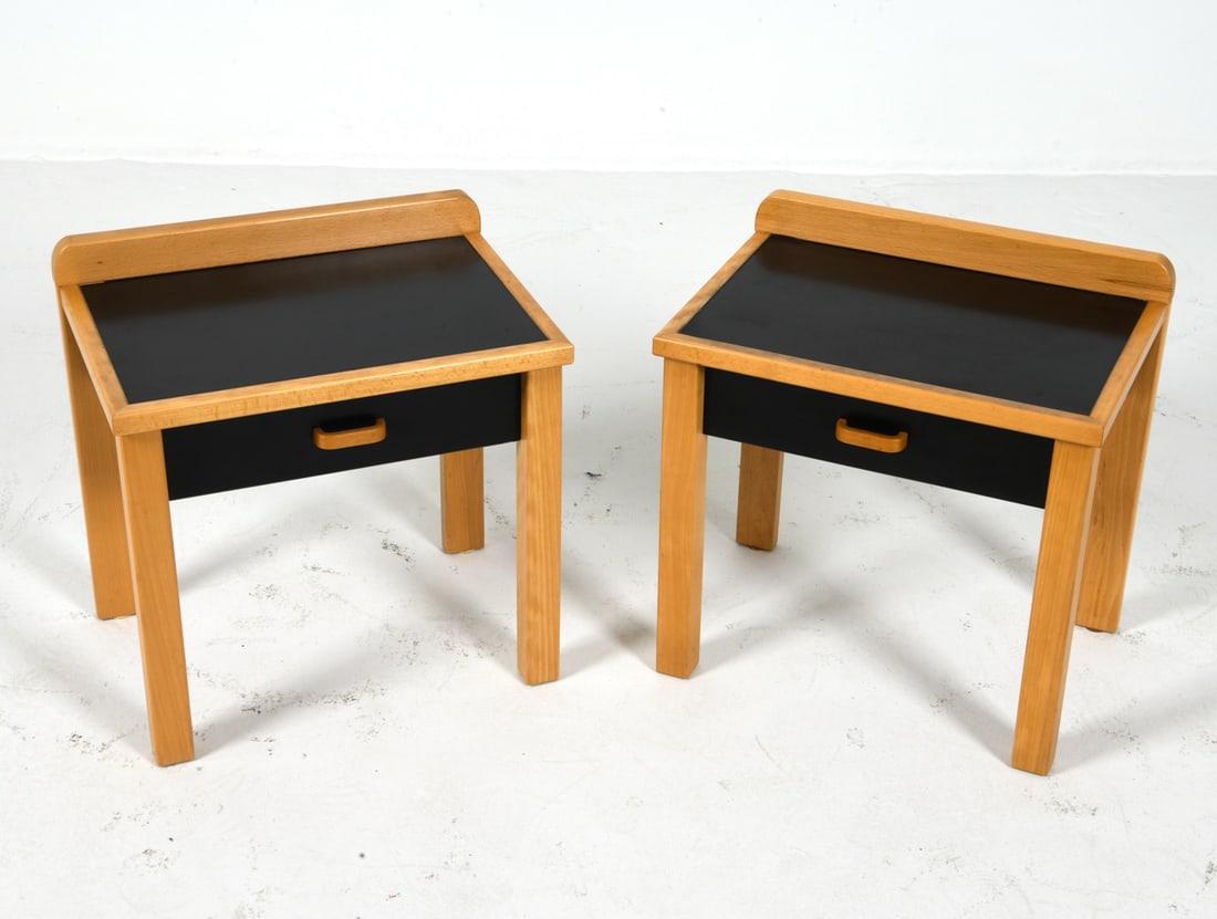 PAIR THYGESEN & SORENSEN DANISH OAK NIGHTSTANDS: Bed side tables or nightstands in the style of Rud Thygesen & Johnny Sorensen for Magnus Olesen. Oak frames with rounded pulls and inlaid black laminate top and sides. Denmark, circa 1980s. Dimensions
