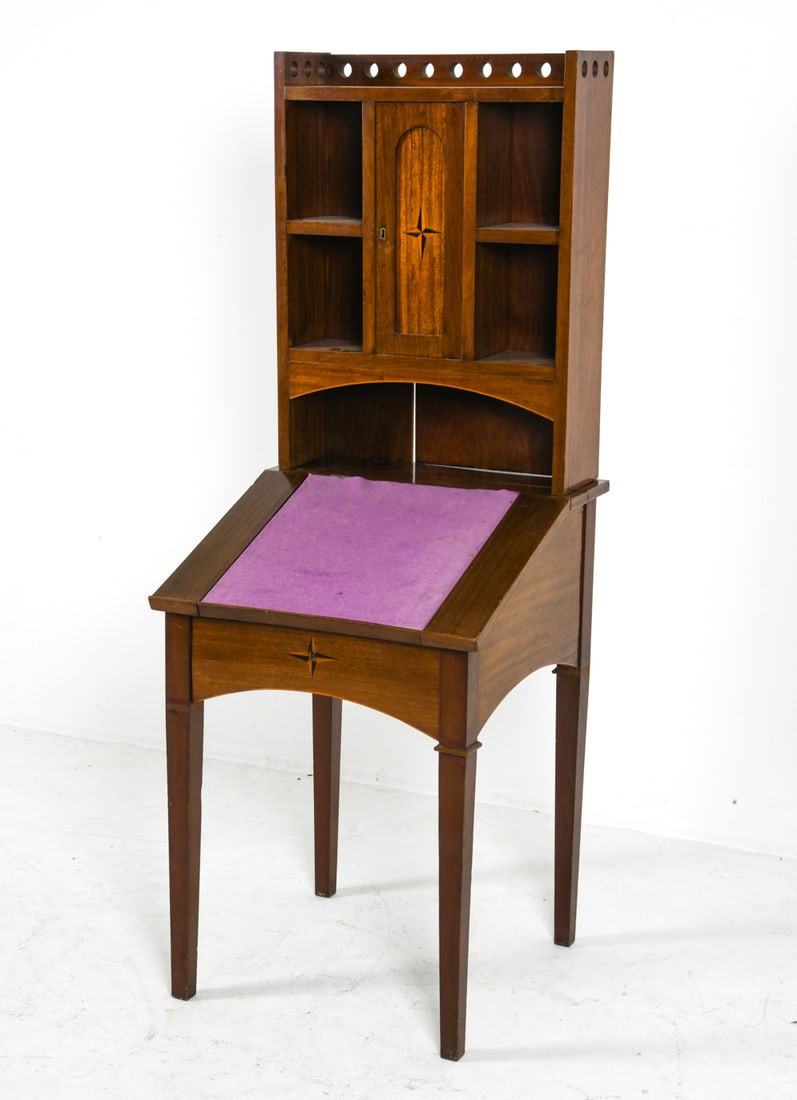 ARTS & CRAFTS STYLE MAHOGANY SECRETARY DESK: English mahogany writing desk with a storage. Top sits freely on base. Wood inlaid decoration. Purple felting to top. England. Dimensions: H 66" x W 24" x D 25". Condition: Key does not turn locks,