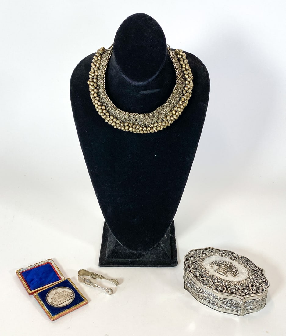 ANTIQUE SILVER GROUPING: Includes silver jewelry box marked 830 underneath; silver commemorative coin, unmarked in box; small silver tongs; silver necklace with bells and ornate decoration, apparently unmarked. Dimensions:
