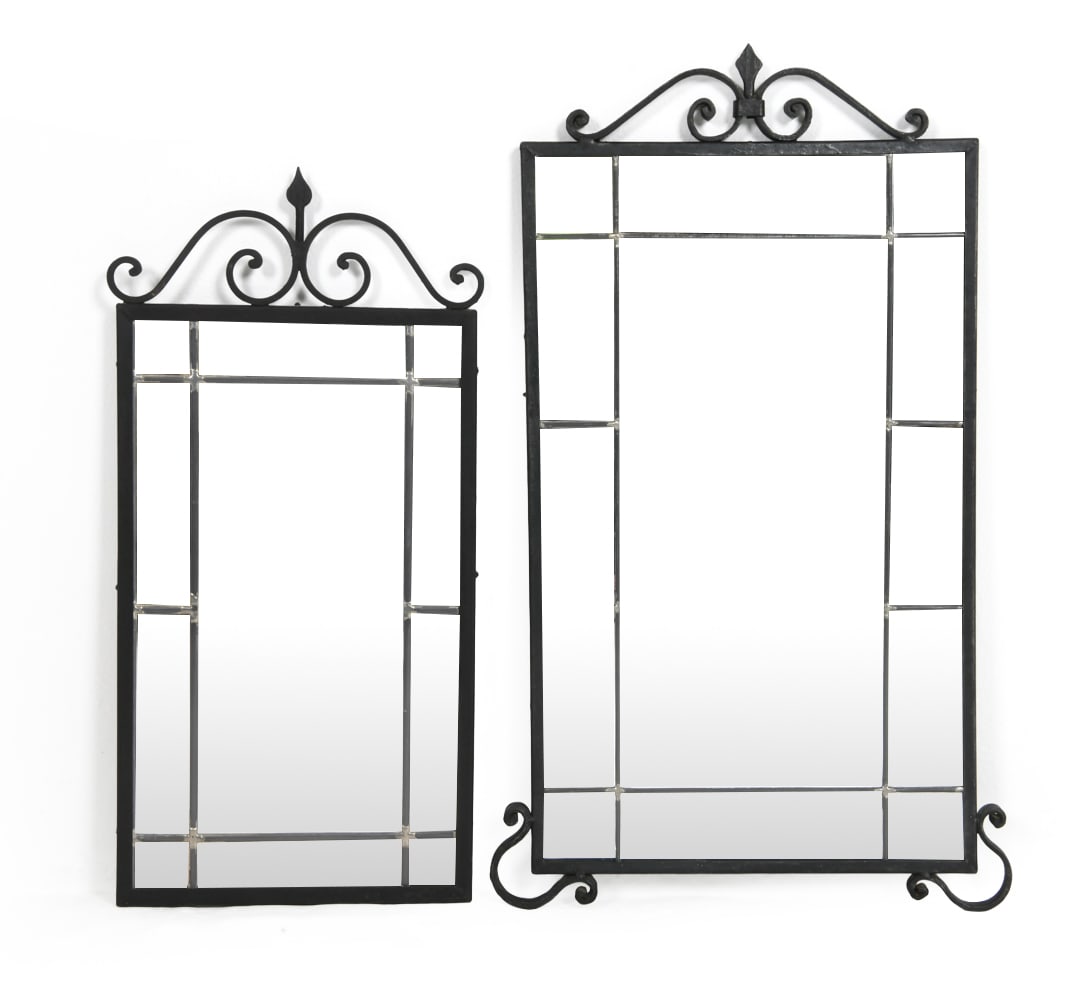 PAIR OF WROUGHT IRON WALL MIRRORS C. 1970S: (2) Wrought iron wall mirrors with leaded glass. Scandinavian, circa 1970s. Dimensions: Largest H 36" x W 18". Condition: One mirror missing hanging wire. Wear consistent with age and use.