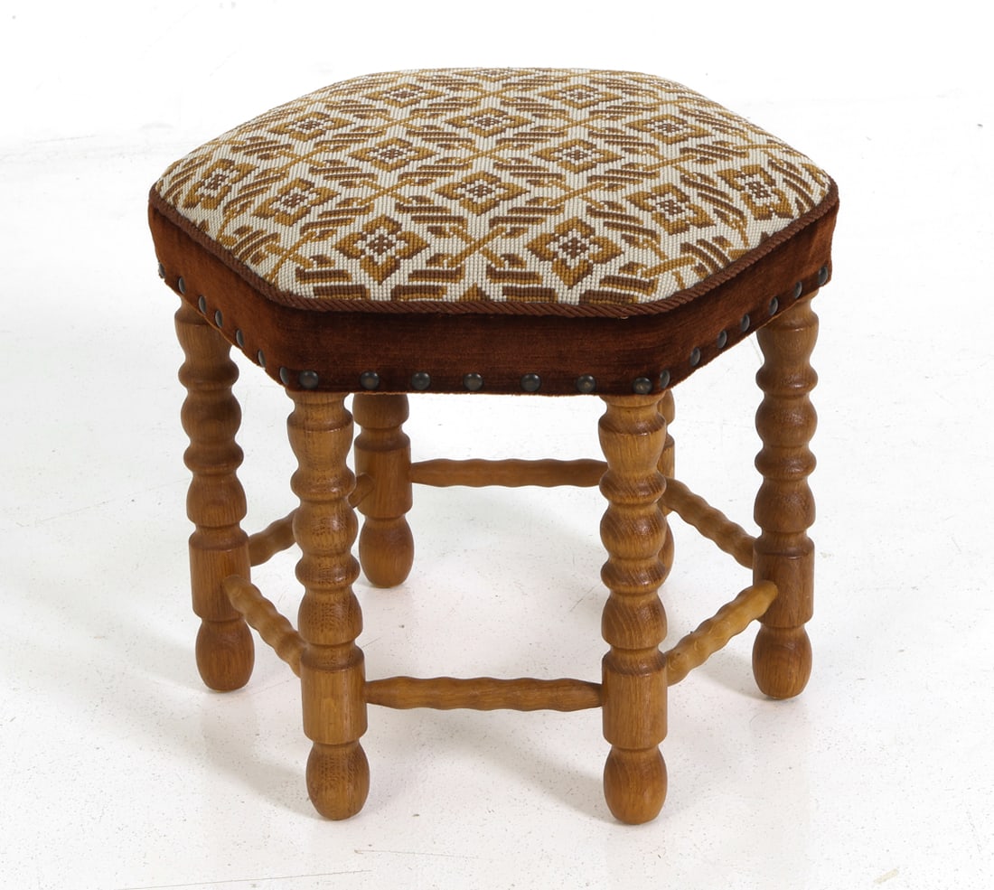 SCANDINAVIAN OAK STOOL C. 1960S: Oak bobbin turned legs and geometric upholstered seat. Scandinavian, circa 1960's. Dimensions: H13.75" x W 15.5" Condition: Wear consistent with age and use. Couple of scuffs.