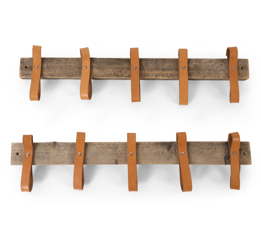 PAIR DANISH OAK & LEATHER COAT RACKS 1960S: With tan leather hangers. Denmark, circa 1960's. Dimensions: H 5.5" x W 23" x D 2" Condition: Minor stress cracks to wood, Minor rubs and scuffs, Wear consistent with age and use.