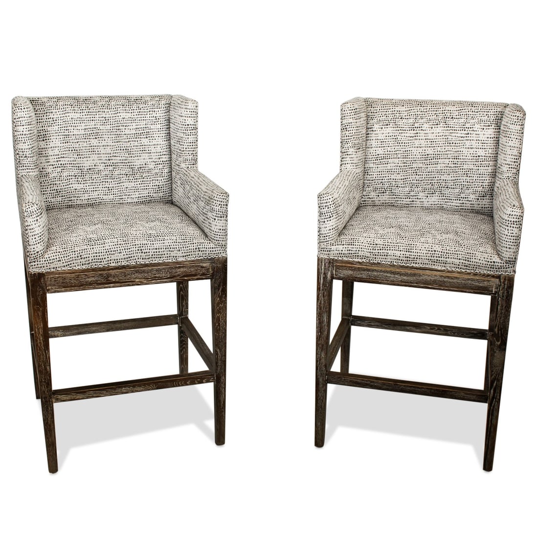 PAIR OF MORGAN TRACK BARSTOOLS: Features tapered legs, a signature of mid century design complement these stool's strikingly angular silhouette. A wooden frame supports the tailored seat and back, providing visual contrast and