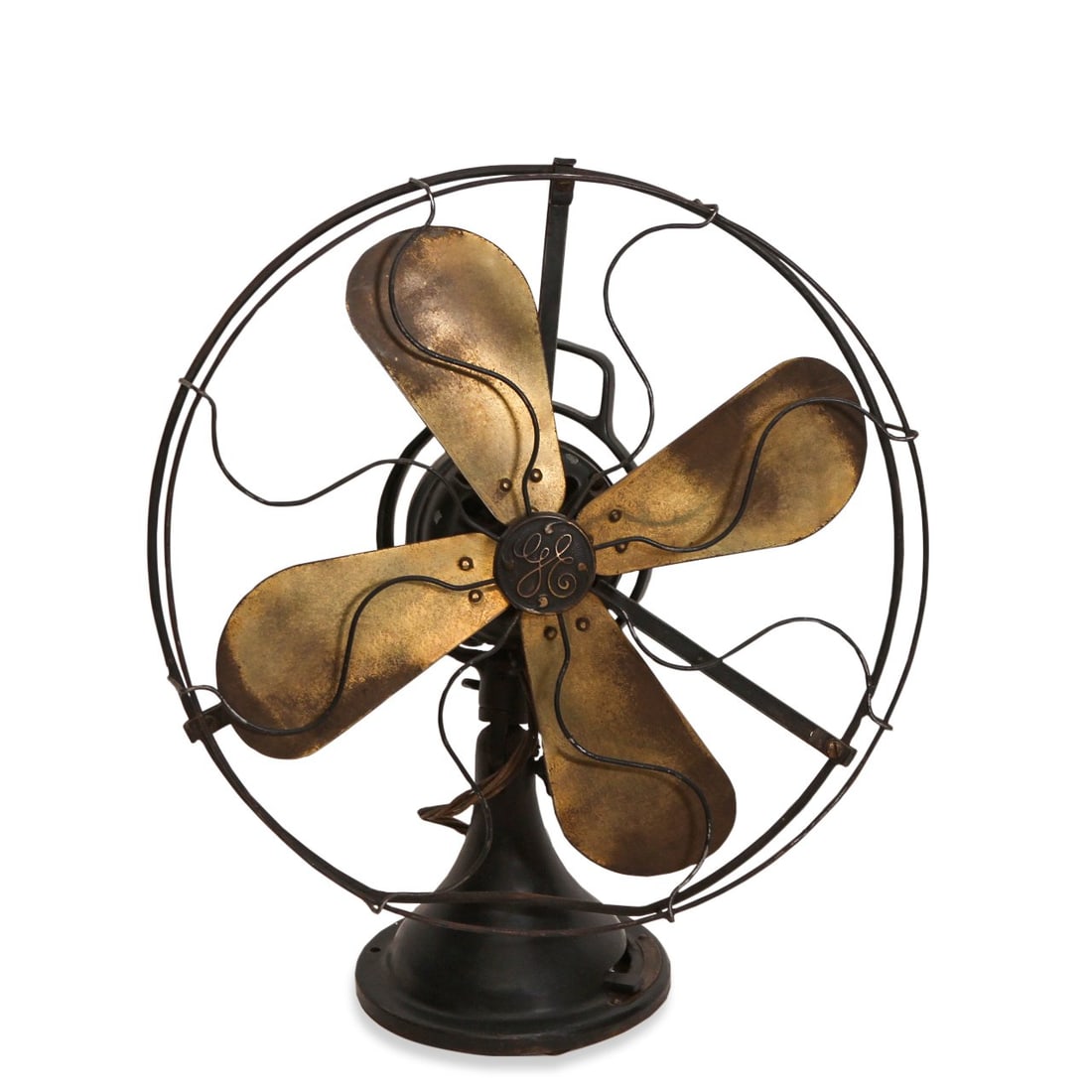 GENERAL ELECTRIC BRASS BLADE FAN, C. 1910: This General Electric Oscillating Brass Blade Fan from 1910 showcases early industrial American craftsmanship. Dimensions: H 32" x 18" x D 8" Condition: Minor scuffs and wear consistent with age and