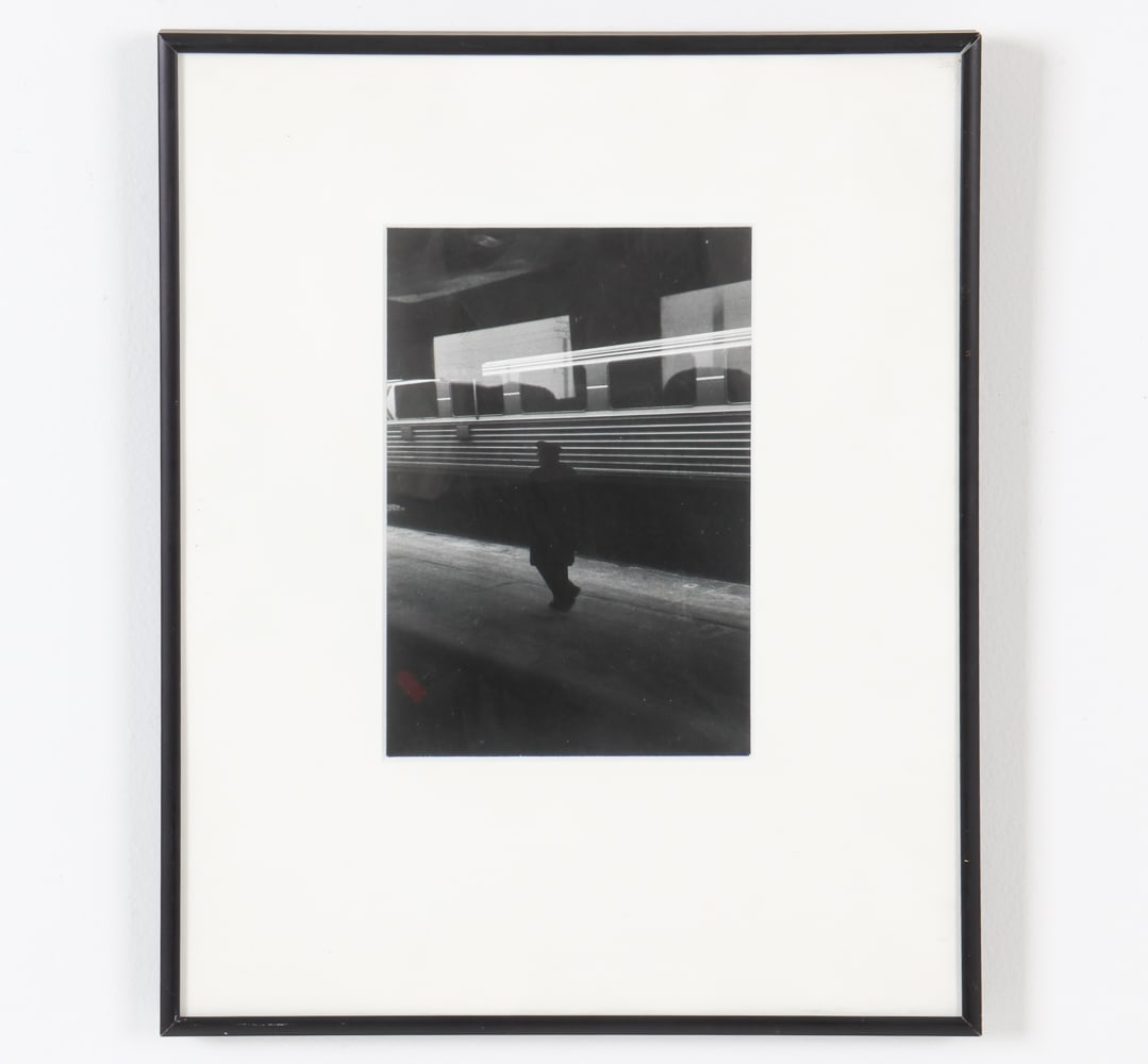 BLACK & WHITE PHOTOGRAPH: Signed by artist on back. Dimensions: Frame H 14" x W 11.5". Sight H 7.25" x W 5.25". Condition: Minor dings to frame.