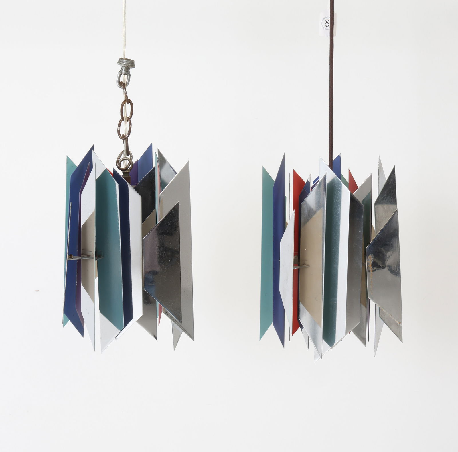 PAIR OF HENNINGSEN FOR LYFA TIVOLI PENDANT LAMPS: A pair of "Tivoli" pendants designed by Simon Henningsen in 1962 and manufactured by Lyfa in the 1960s. The pendants are of chrome-plated and lacquered metal. Dimensions: H 12.75" x W 8" x D 8"