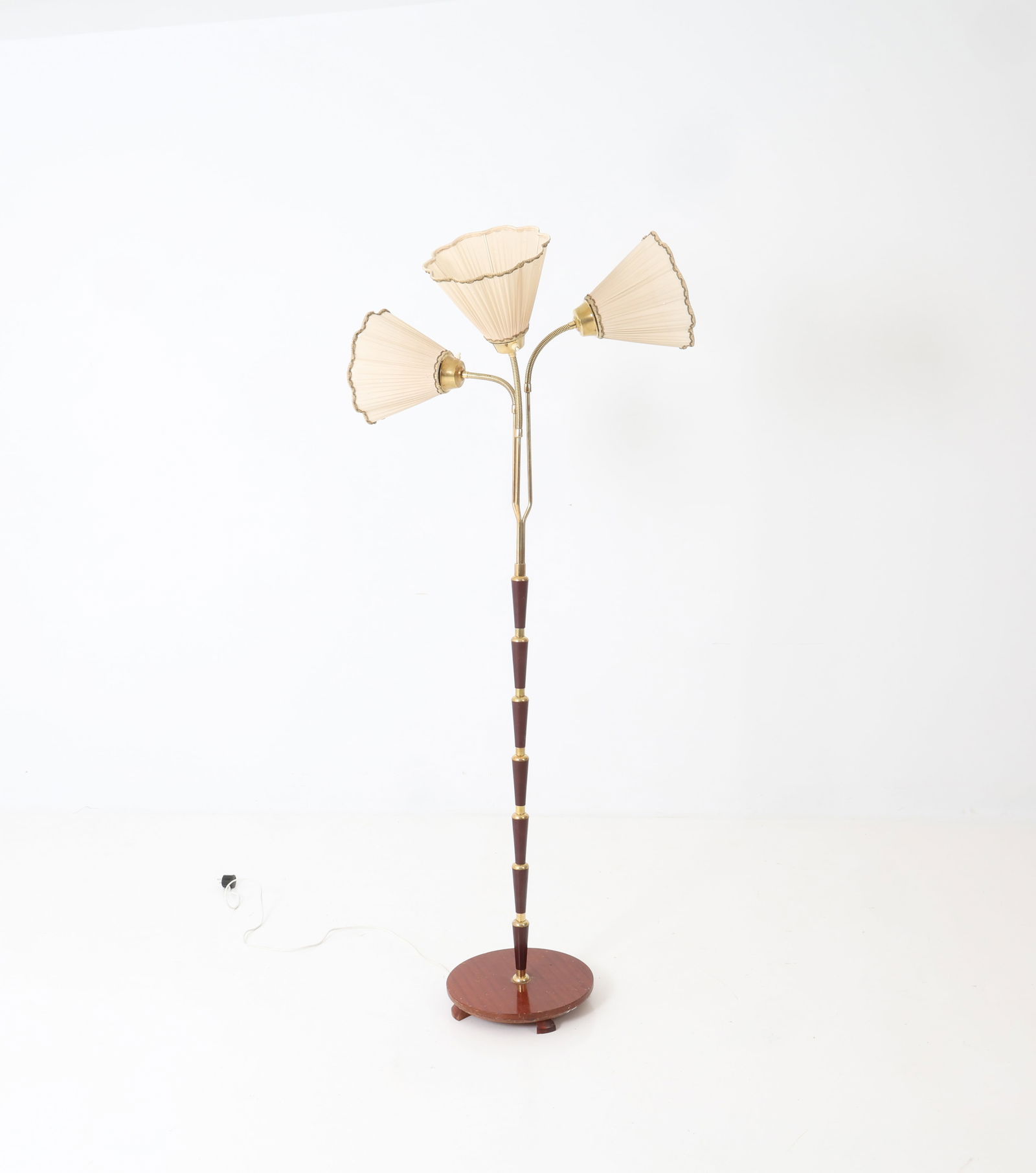 SWEDISH MID-CENTURY 3 LIGHT FLOOR LAMP: With three articulated lights. Dimensions: H 67.5" x Dia. 29.5" Condition: Not Tested, Wear consistent with age and use.