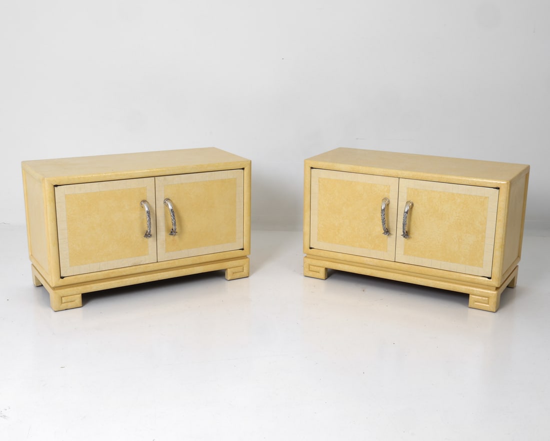 PAIR SAMUEL MARX STYLE CHESTS W SILVER PLATED PULL: Deco style cabinets in lacquered wooden frame with silver-plated metal handles. circa 1950s. Dimensions: H 23" x W 38" x D 16" Condition: Wear consistent with age and use, including dings and rubs to