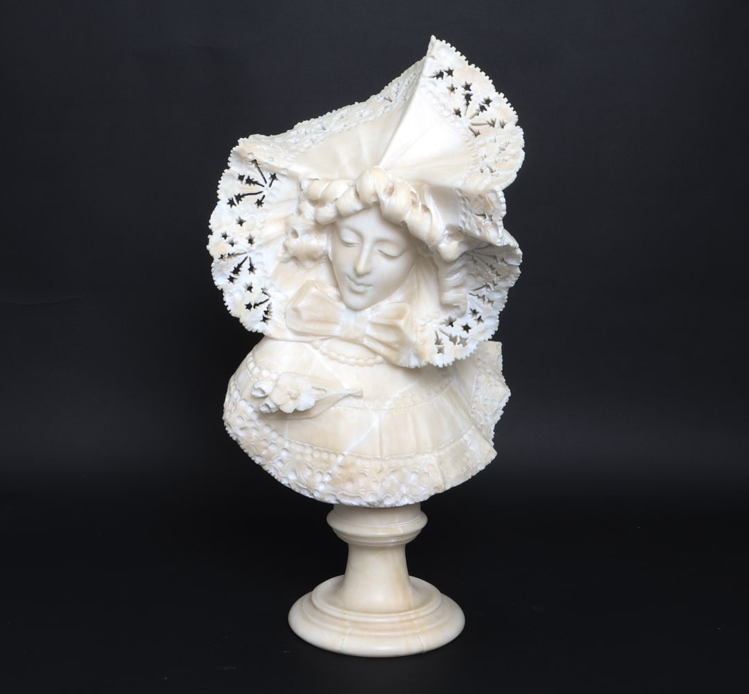 ADOLFO CIPRIANI STYLE ITALIAN ALABASTER SCULPTURE: Elaborately carved and sculpted alabaster bust of a woman wearing a lace hat. Indistinctly signed on the backside. Top removable from base. Dimensions: H 19" x W 9.5" x D 6" Condition: Light wear