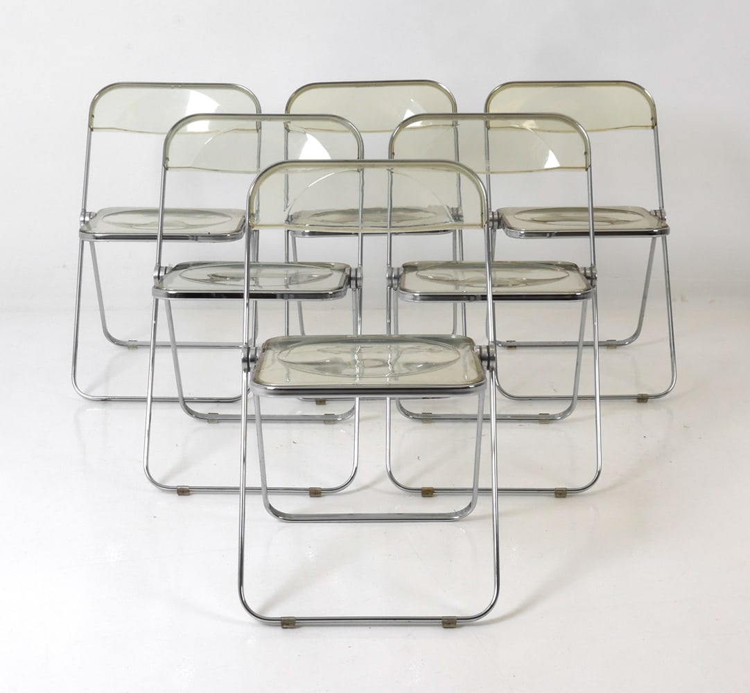 (6) PIRETTI FOR CASTELLI 'PLIA' FOLDING CHAIRS: Grouping of six acrylic folding chairs with tubular design. Designed by Giancarlo Piretti for Anonima Castelli. Italy, circa 1960s. Dimensions: H 29.5" x W 18.5" x D 17.5" x Sh 17.25" Condition: Wear