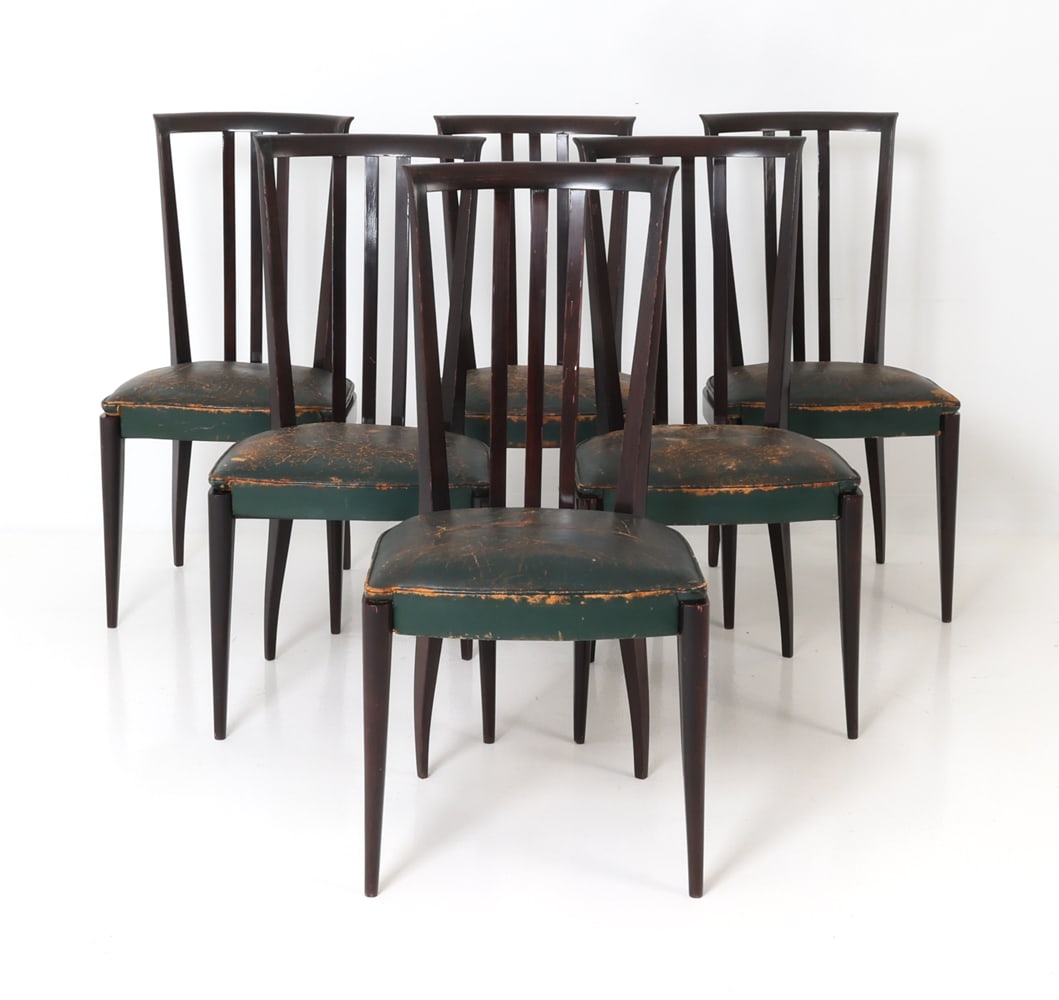 (6) FRENCH DECO MAHOGANY & LEATHER DINING CHAIRS: Dark-stained mahogany frame with lacquer finish. Curved rail backrest and green leather upholstery. 20th century. Dimensions: H 39.75" x W 19" x D 22" x Sh 19" Condition: Dings and rubs to backrest