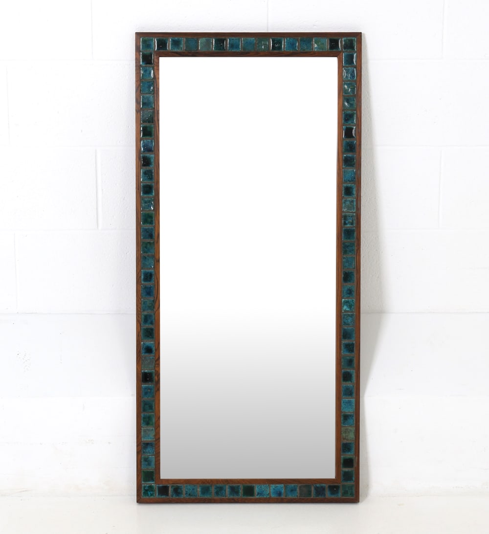 CENTRUM MOBLER DANISH ROSEWOOD & TILE MIRROR: Rosewood frame wall mirror with inset blue ceramic tiles surrounding the glass. Labeled on backside. Denmark, circa 1960s. Dimensions: H 43" x W 20.5" Condition: Corner and edge losses to frame,