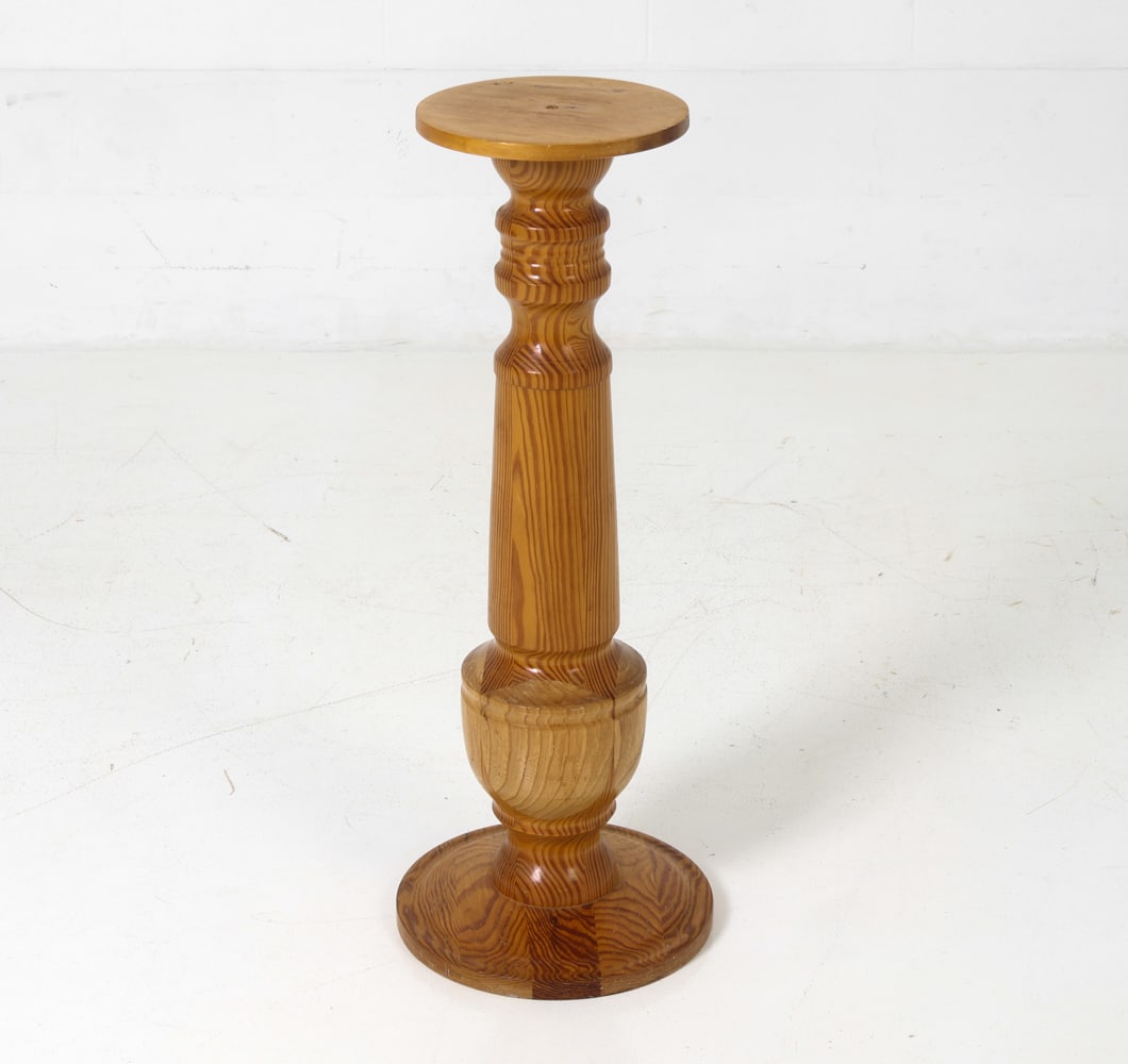 VINTAGE SWEDISH PINE PEDESTAL 1960S: Turned pine pedestal/stand. Sweden, circa 1960's Dimensions: H 32" x Dia 13" Condition: Minor scuffs and nicks. Wear consistent with age and use. PR126