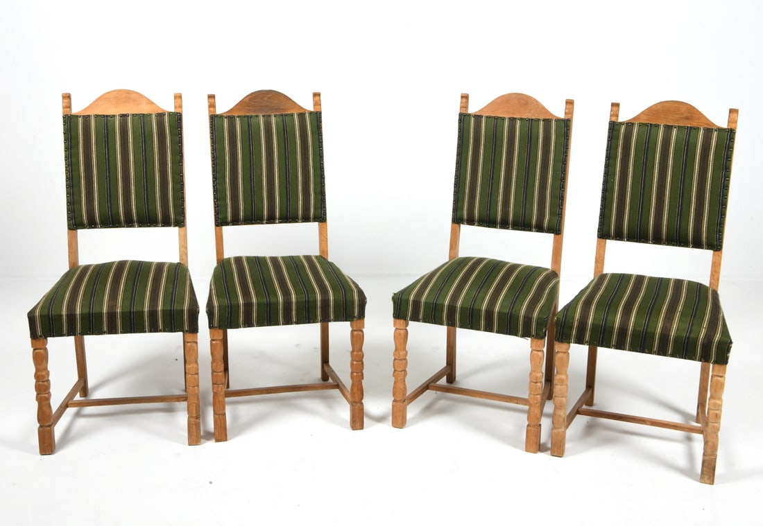 (4) KJAERNULF STYLE DANISH OAK DINING CHAIRS 1970S: Oak frames with striped green upholstery. Brass tacks accent. Denmark, circa 1970s. Dimensions: H 40" x W 19" x D 21.75" S.H. 17.25". Condition: Showing signs of wear including tears to upholstery. On