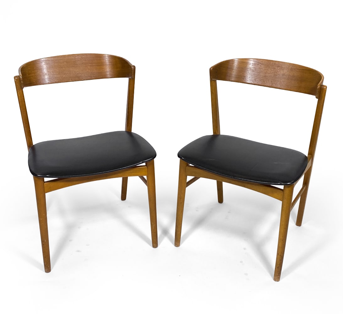 PAIR OF FARSTRUP DANISH TEAK DINING CHAIRS C.1960S: Model 206. Teak frames with black vinyl leather upholstered seats. Apparently untagged. Denmark, circa 1960s. Dimensions: H 30" x W 20" x D 18" x SH 16.5". Condition: Scuffs and scratches to frames an