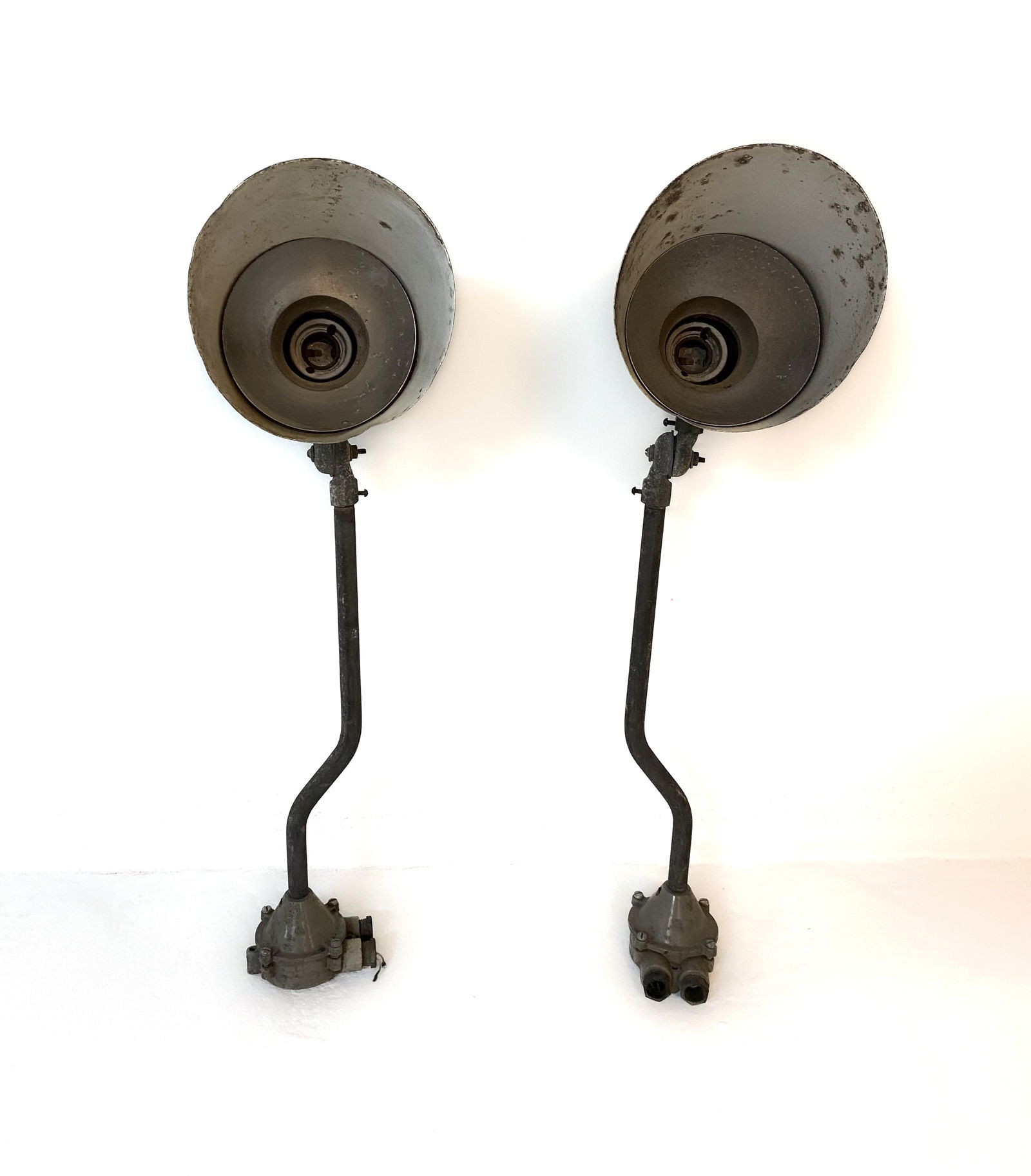 PAIR OF SCANDINAVIAN OUTDOOR WALL SCONCES C. 1960S: (2) Outdoor wall sconces with steel arms and aluminum shades. Scandinavian, circa 1960s. Dimensions: H 22" x W 10" x D 7.25". Condition: Several scratches, scuffs, rubs, oxidation. Wear consistent wit
