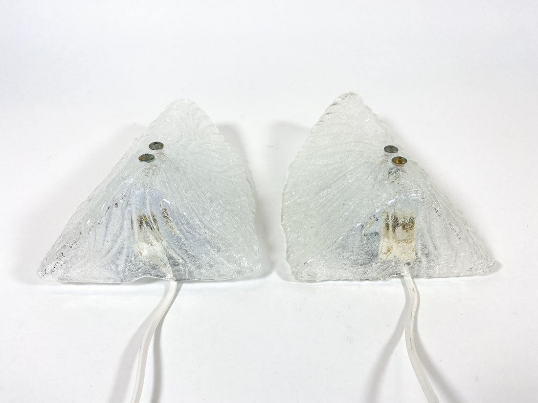 PAIR GLOBEN MODEL 6310 SWEDISH GLASS SCONCES 1960S: (2) Pressed glass wall sconces. Marked to wall bracket. Sweden, circa 1960s. Dimensions: H 9" x W 6.25" x D 3.25". Condition: Wiring untested, European plugs. Minor scuffs. Wear consistent with age an