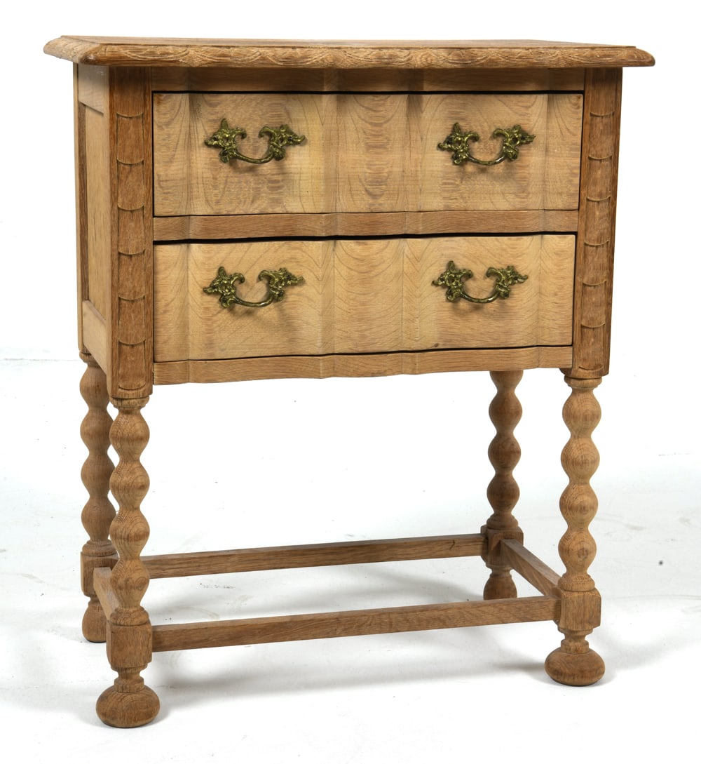 ATTR HENNING KJAERNULF DANISH OAK SIDE CHEST 1970S: Small oak side chest with drawers in carved details. Serpentine front and brass drawer pulls. Denmark, circa 1970s. Dimensions: H 24.75" x W 21.5" x D 12.5". Condition: Fading and discoloration to fra