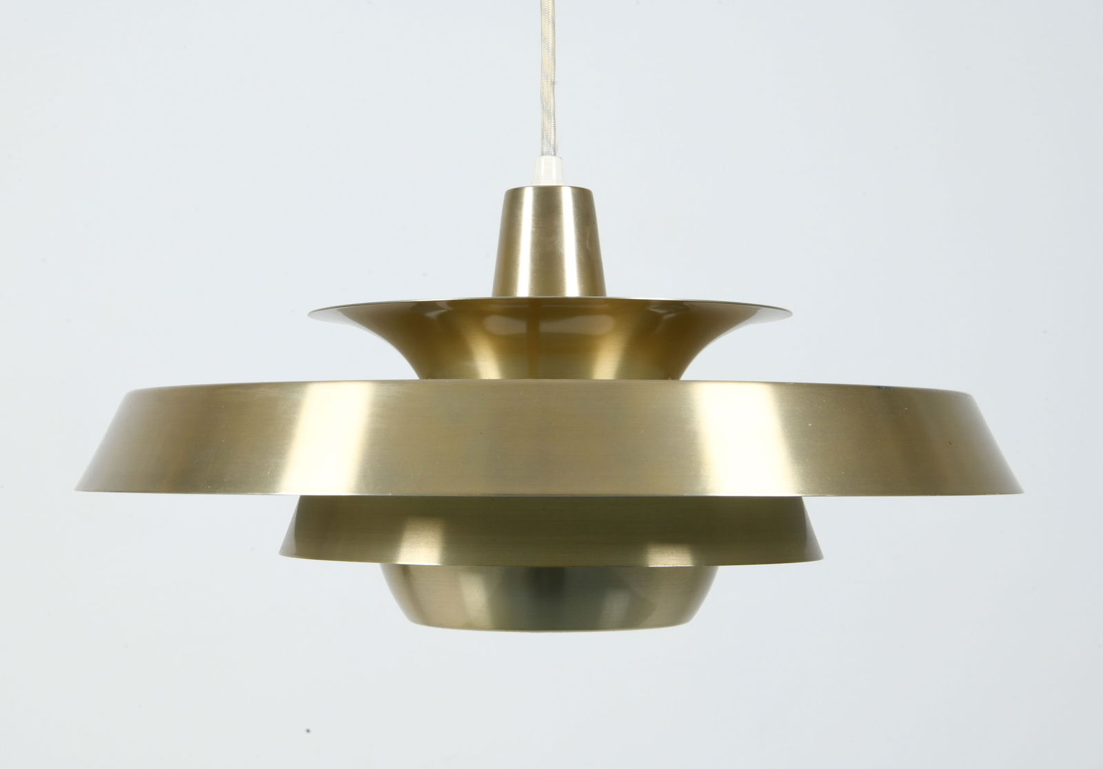 LYSKAER DANISH STEEL PENDANT LIGHT C. 1960S: Steel pendant light with brass toned finish. Denmark, circa 1960s. Dimensions: Dia. 17". H 9". L Cable 30". Condition: Wear consistent with age and use. Wiring untested.