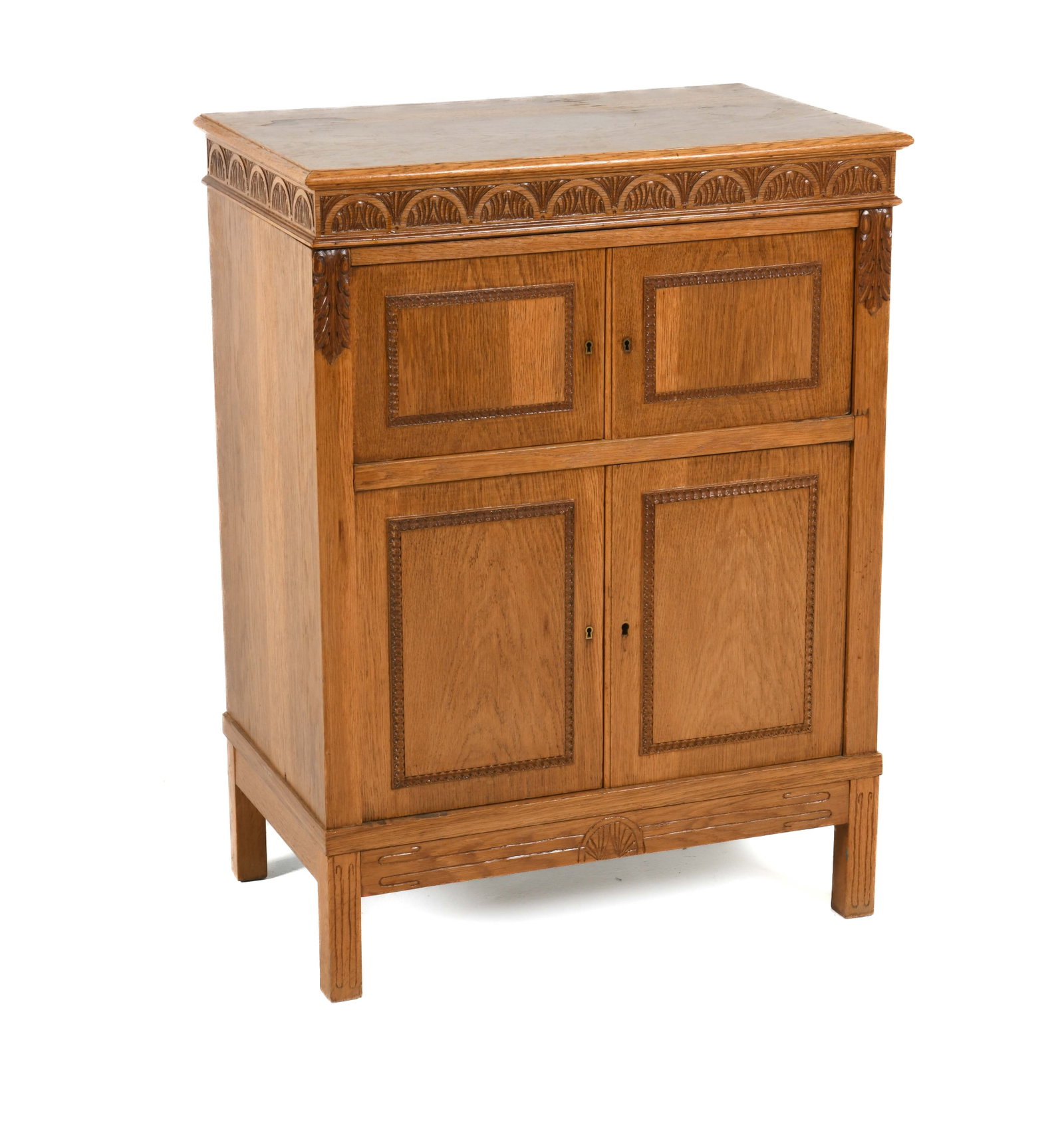 RENAISSANCE REVIVAL STYLE DUTCH OAK CABINET: Oak with carved decoration to front. Netherlands, 20th century. Dimensions: H 38" x W 28.5" x D 17.5". Condition: No key. Scuffs and scratches. Missing shelf. Wear consistent with age and use, includi