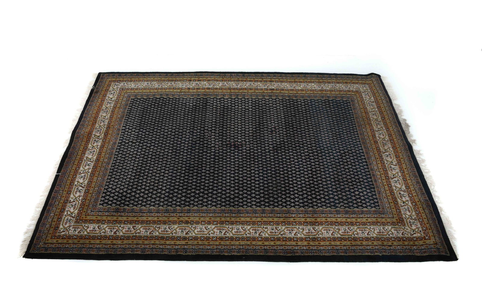 HAND-KNOTTED ORIENTAL WOOL RUG: Hand-woven wool rug with blue and white complex geometric design. 20th century. Dimensions: L 140" x W 100". Condition: Wear consistent with age and use. Few small stains.