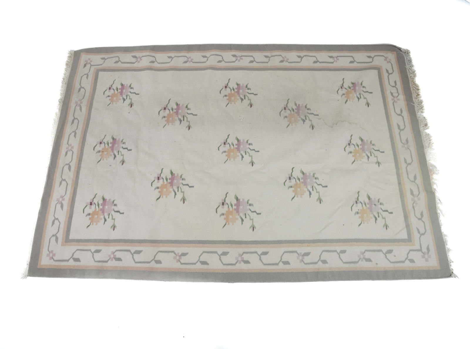 HAND-KNOTTED FLORAL WOOL RUG: Hand-woven wool rug with pastel floral designs. Mid 20th century. Dimensions: L 119" x W 78.5". Condition: Wear consistent with age and use. Few minor stains.